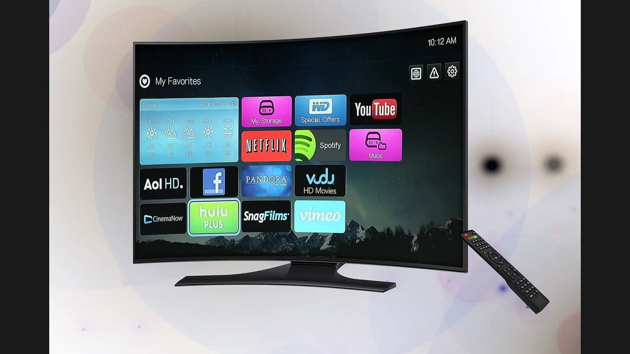 A curved television showing a My Favorites grid of streaming app icons